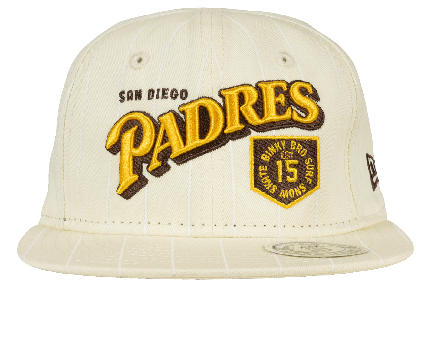 Cream snapback hat featuring "San Diego Padres" in bold yellow lettering and a vintage-style patch.
