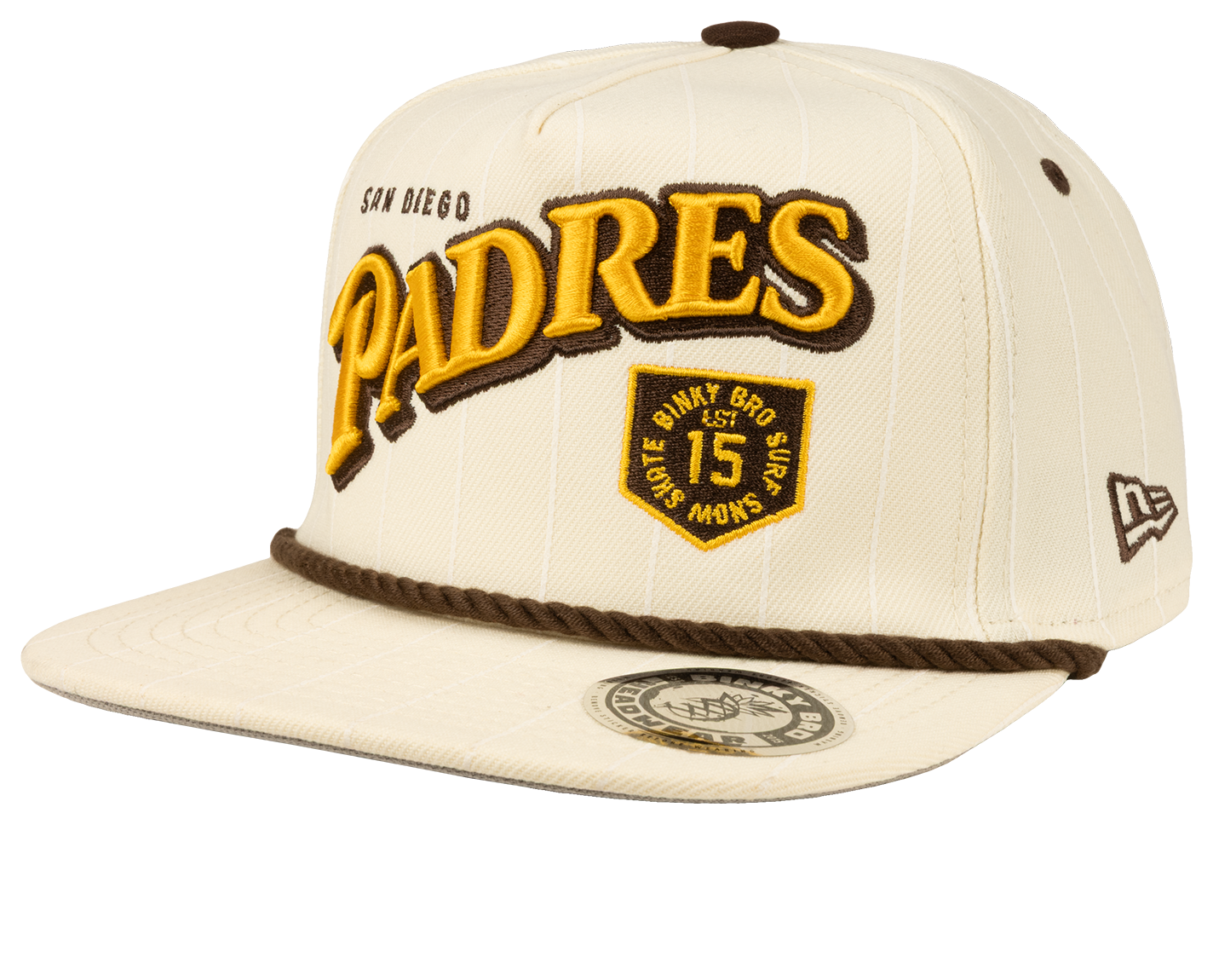 Cream snapback hat featuring "Padres" in yellow and brown embroidery, with a vintage logo patch and rope detail.